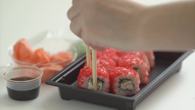 Sushi and rolls. Delicious seafood dinner. Japanese style serving, selective focus