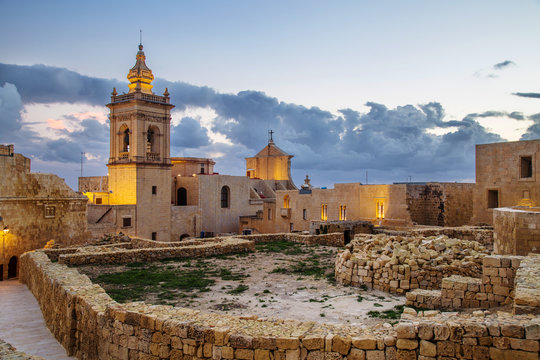 Night view of Citadel, The Cittadella in Maltese, also known as the Gran Castello, a citadel in Victoria, on the island of Gozo in Malta. Popular touristic attraction and destination.