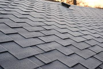 Close up view on Asphalt Roofing Shingles Background. Roof Shingles - Roofing. Roof shingles...