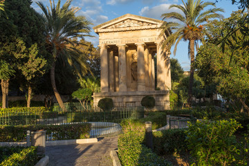 Ancient style Monument to Sir Alexander Ball in Lower Barrakka Gardens in Valletta, capital city of Malta. November, popular touristic attraction and destination.