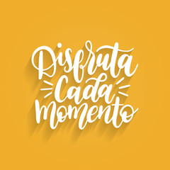 Disfruta Cada Momento translated from spanish Enjoy Every Moment vector handwritten phrase on yellow background. - obrazy, fototapety, plakaty