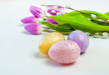 Fototapeta na wymiar Colored eggs on white background. Easter, Spring holidays
