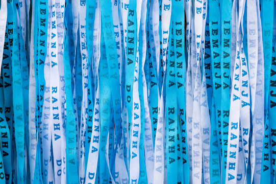 Blue Brazilian wish ribbons celebrating the Festival of Yemanja, Rainha do Mar (Queen of the Sea, in the Yoruba religion) in Salvador, Bahia, Brazil