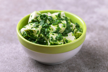 Traditional Indian cuisine. Homemade palak paneer. Copyspace, horizontal view