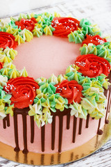 Birthday cake with flowers rose on white background