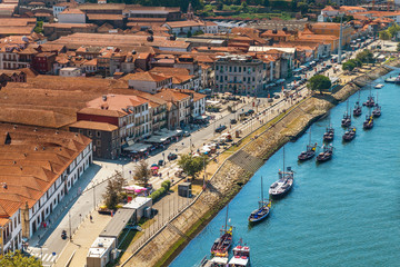 View on Vila Nova de Gaia on Douro river in Porto, Portugal. British wine and port cellars -...
