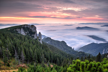 Beautiful mountain landscape of a foggy morning, Ceahlau massif, Eastern Carpathians, Moldova, Romania