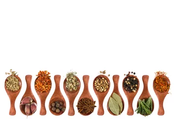 Poster Different seasonings and spices in wooden spoons © Nataliia Pyzhova