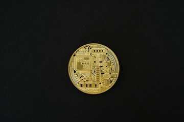 Gold Bitcoins isolated on black background