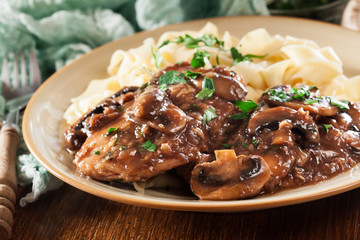 Delicious chicken marsala served with fettucine pasta