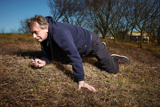 Older Man Felt While Running In Park. Wounded Waiting For Help 