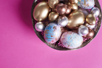 Close up of easter eggs in basket .