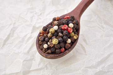 black pepper peas on a wooden spoon
