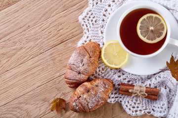 white cup of tea with cookies on a wooden background white cup of tea with cookies on a wooden background. copy space.