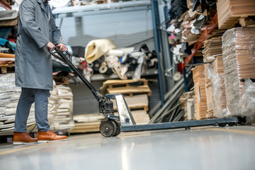 Working at leather warehouse at shoe factory used warehouse equipment