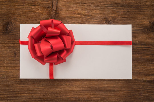   Envelope With Red Ribbon And Bow 