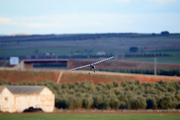 Almagro, Spain - January 27, 2018: Model airplane approaching to land.