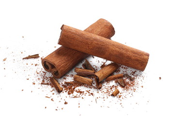 Cinnamon sticks with shavings isolated on white background