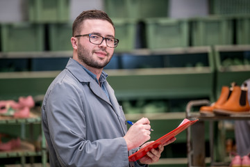 manager at a leather shoe manufacturing factory