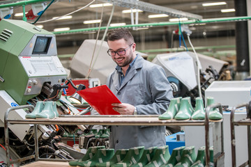 manager at a leather shoe manufacturing factory