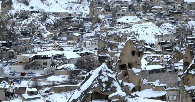 A view of ancient village with cave houses on a winter snowly day in Urgup Nevsehir Cappadocia Turkey. 28 Jan 2018 Cappadocia&rsquo;s &ldquo;fairy chimneys,&rdquo; cone-shaped rock formations.