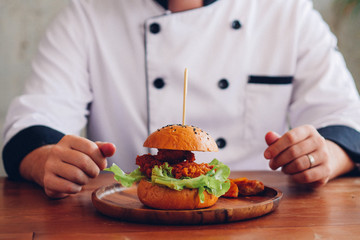 chef cooking beef burger