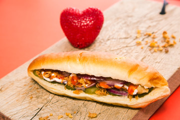 Valentin's day snack with chicken sausage and onion chips.