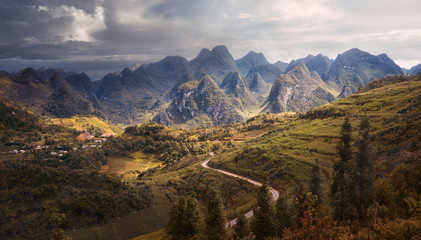 A beautiful panoramic view of many rocky peaks karst plateau Dong Vang - obrazy, fototapety, plakaty