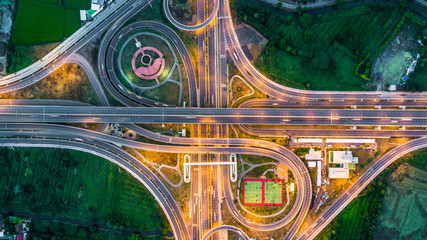 Highway, Expressway, Motorway, Toll way at night, Aerial view interchange of Bangkok City,  Highway, Expressway, Motorway, Toll way is an important infrastructure in Thailand.