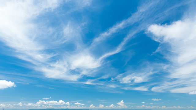 Cirrostratus cloudscape or Fluffy cirrus clouds on blue blue sky, Beautiful cirrocumulus on the high altitude layer
