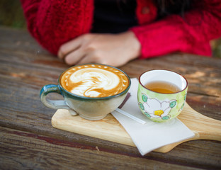a cup of coffee on table