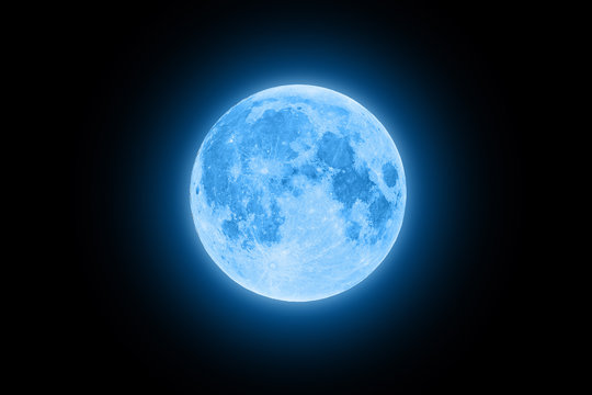 Naklejka Blue super moon glowing with blue halo isolated on black background