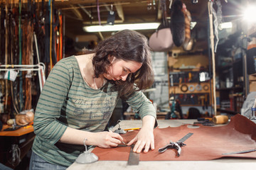 Fototapeta na wymiar Working process in the leather workshop.