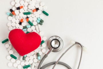 Assorted Pharmaceutical or medicine with red heart and stethoscope. Healthcare and Medical concept.