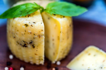 Rustic cheese with herbs and peppercorn