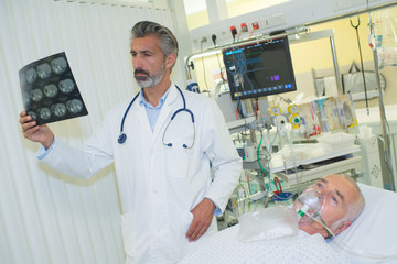 man checking xray