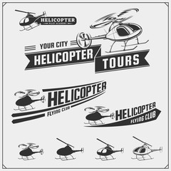 Set of helicopter emblems, labels, badges and design elements. © malashkos