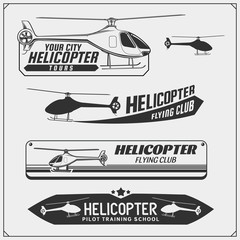 Set of helicopter emblems, labels, badges and design elements.