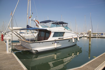 Fototapeta premium Yachts in the port waiting. Rimini, Italy.
