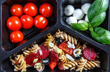 Healthy food and diet concept. Dietary catering. Restaurant dish delivery. Fitness meal. Take away. Fit and eat. Weight loss nutrition in foil boxes.