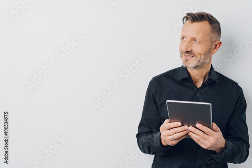 Confident successful businessman on white