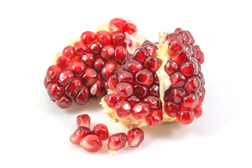 Ripe fresh pomegranate,pomegranate seeds, fruit isolated on white background cutout,