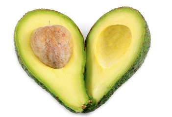Two slices of fresh avocado with heart symbol isolated on the white background, in healthy concept with clipping path.