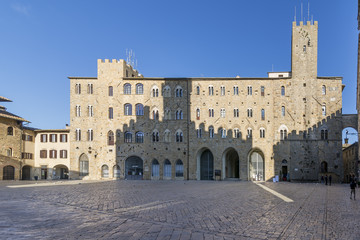 Obraz premium Pretorio Palace and Porcellino Tower, Priori square in a quiet moment of the day, Volterra, Pisa, Tuscany, Italy