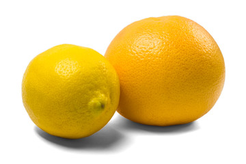 Grapefruit and lemon isolated on a white background