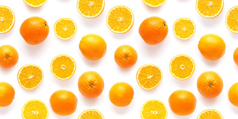 Seamless pattern of fresh oranges isolated on white background, top view, flat lay. Food texture background. Healthy food, detox, diet.