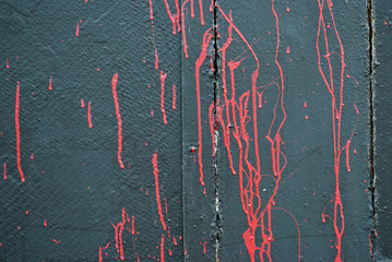 Concrete gray wall, concrete slate, streams of spray paint, graffiti, street art, red, gray, scarlet, background, old, texture, graphics, roughness, attrition, vintage, abstraction, antiquity