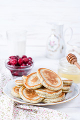 Homemade pancakes with poppy seeds with honey for tasty healthy breakfast