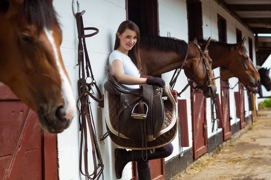 Smiling jockey posing for camera 