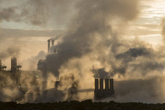 Smoke emitting from factory